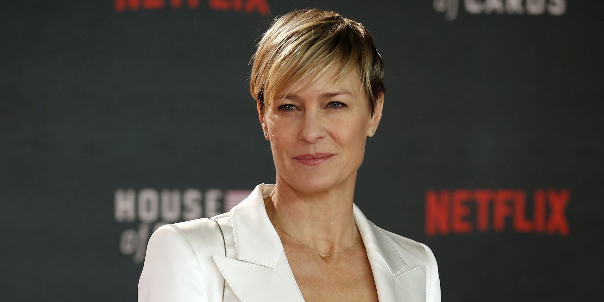 US actress Robin Wright poses for photographers on the red carpet ahead of the world premiere of the television series 'House of Cards - Season 3 Episode 1' in London on February 26, 2015.  AFP PHOTO / JUSTIN TALLIS        (Photo credit should read JUSTIN TALLIS/AFP/Getty Images)
